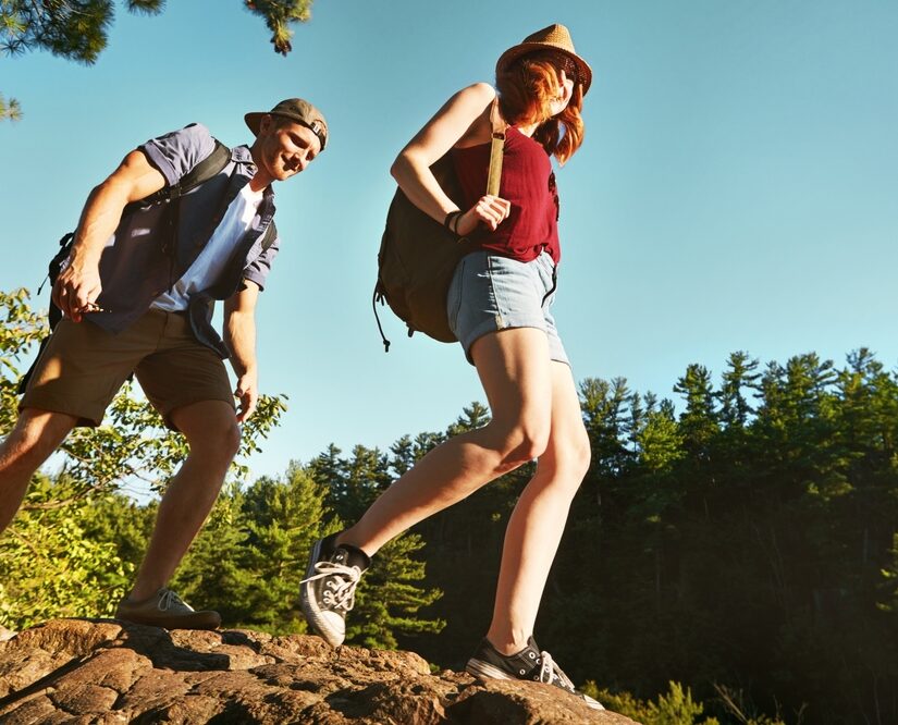 Nature,,Hiking,And,Couple,Walking,With,Blue,Sky,On,Adventure